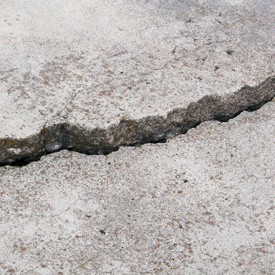 cracked concrete cement sidewalk foundation